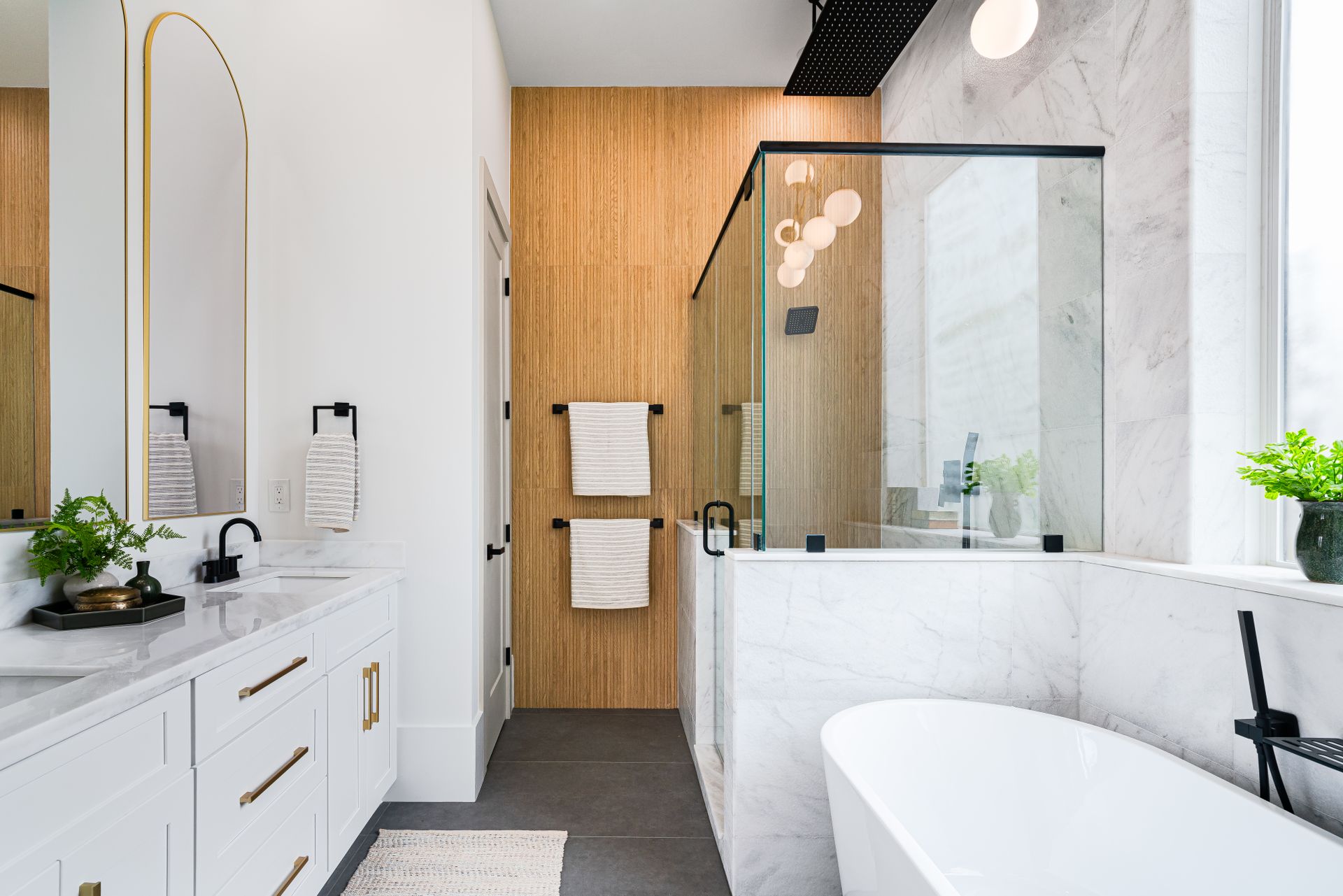 Contemporary marble and glass bathroom interior